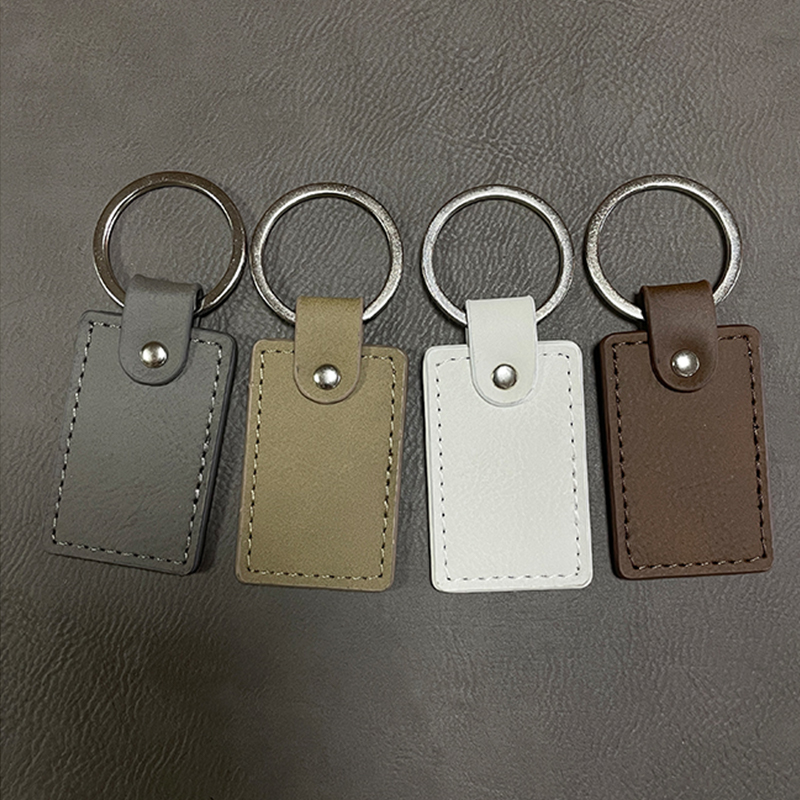 Laserable Leatherette Rectangle Keychains with Oiled Edge Laserable Leatherette Rectangle Keychains with Oiled Edge