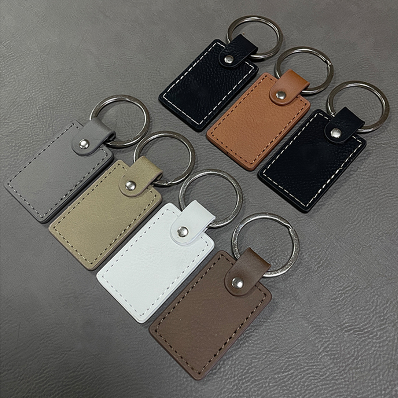 Laserable Leatherette Rectangle Keychains with Oiled Edge Laserable Leatherette Rectangle Keychains with Oiled Edge