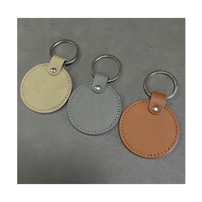 Laserable Leatherette Round Keychains with Oiled Edge Laserable Leatherette Round Keychains with Oiled Edge