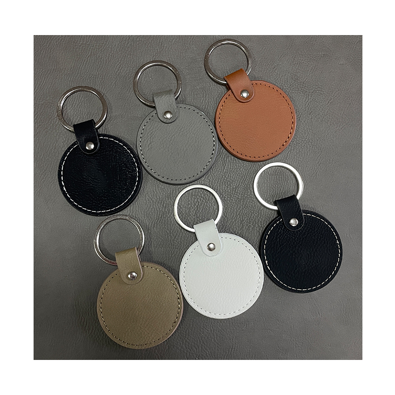 Laserable Leatherette Round Keychains with Oiled Edge Laserable Leatherette Round Keychains with Oiled Edge