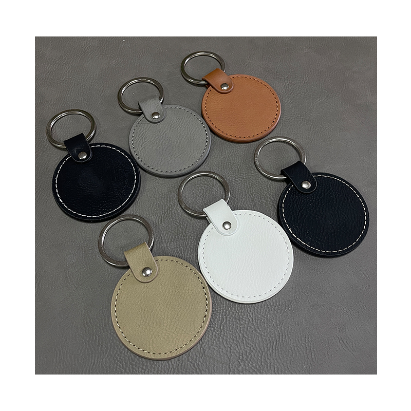 Laserable Leatherette Round Keychains with Oiled Edge Laserable Leatherette Round Keychains with Oiled Edge
