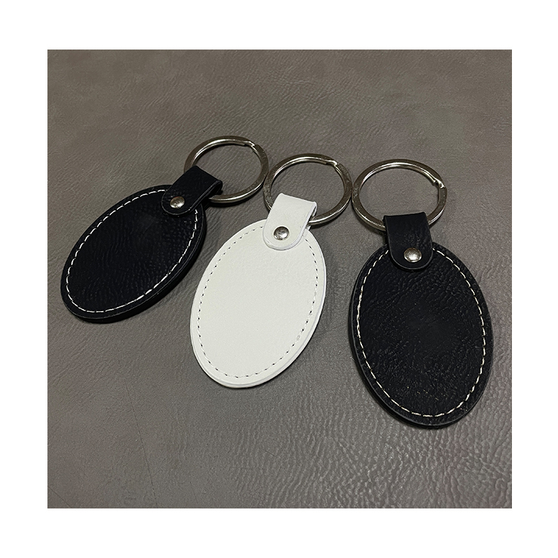 Laserable Leatherette Oval Keychains with Oiled Edge Laserable Leatherette Oval Keychains with Oiled Edge
