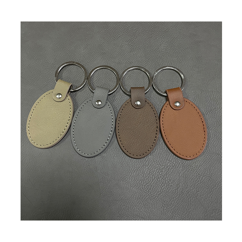 Laserable Leatherette Oval Keychains with Oiled Edge Laserable Leatherette Oval Keychains with Oiled Edge