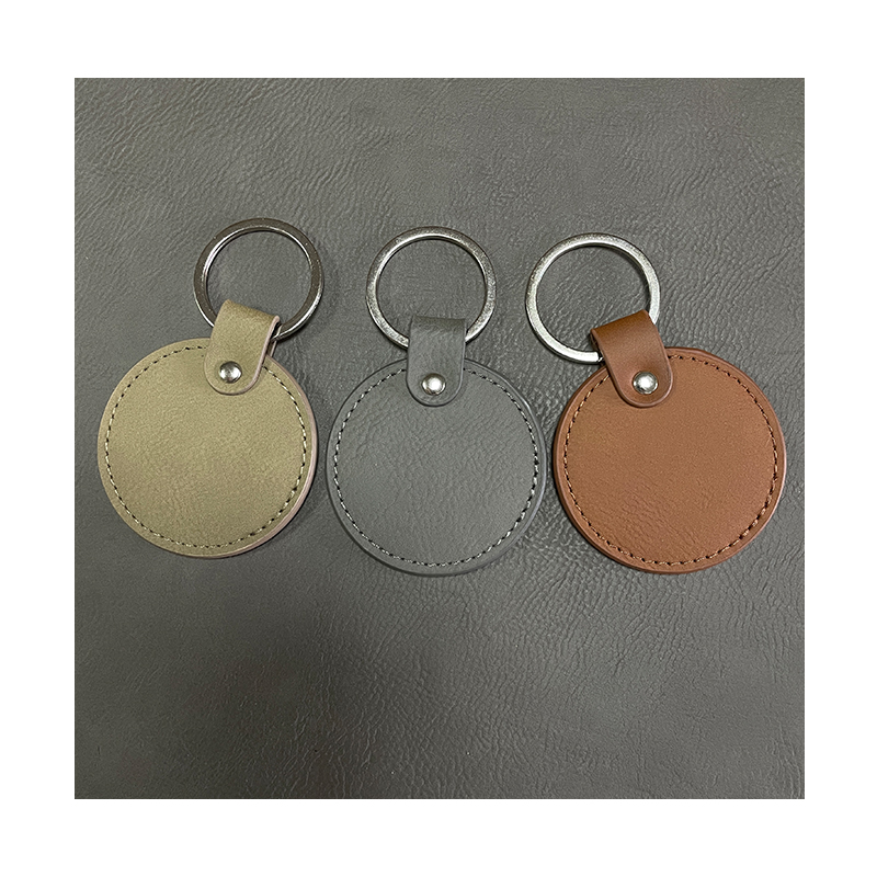 Laserable Leatherette Round Keychains with Oiled Edge Laserable Leatherette Round Keychains with Oiled Edge
