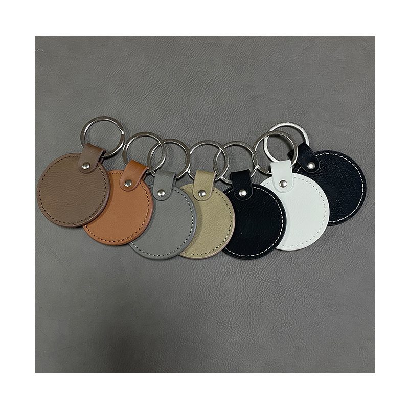 Laserable Leatherette Round Keychains with Oiled Edge Laserable Leatherette Round Keychains with Oiled Edge