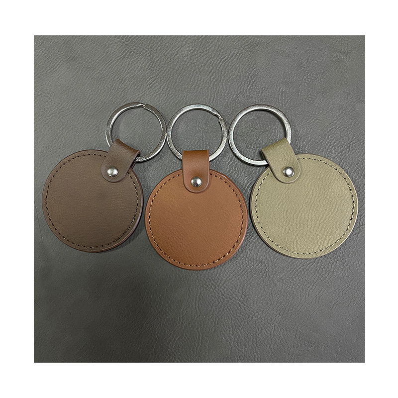 Laserable Leatherette Round Keychains with Oiled Edge Laserable Leatherette Round Keychains with Oiled Edge
